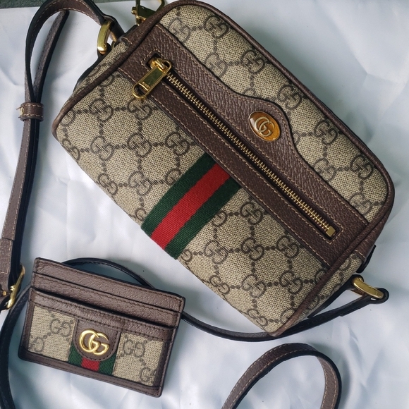 Gucci Handbags - Gucci Beige and Brown Crossbody Bag with Gold Accents
